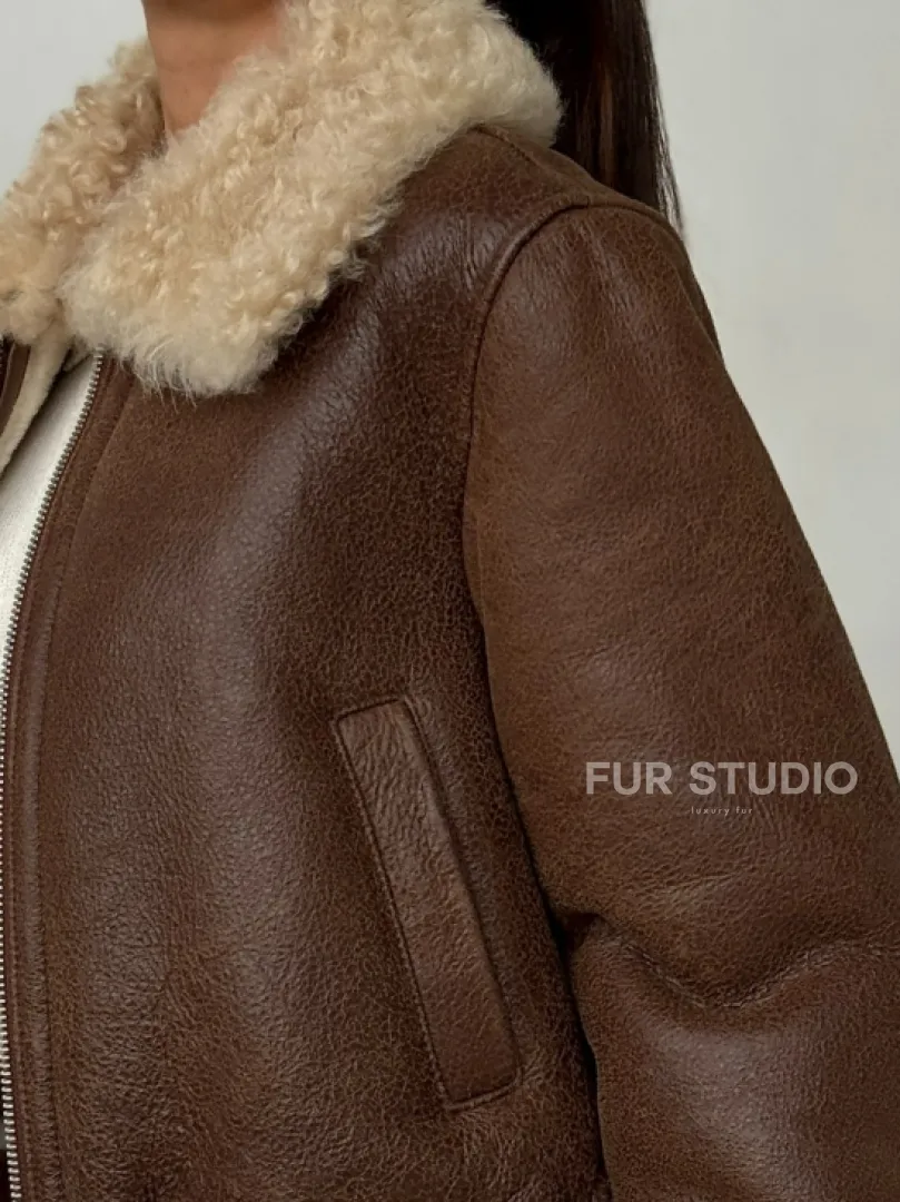 Короткая дубленка - женская - фото 1