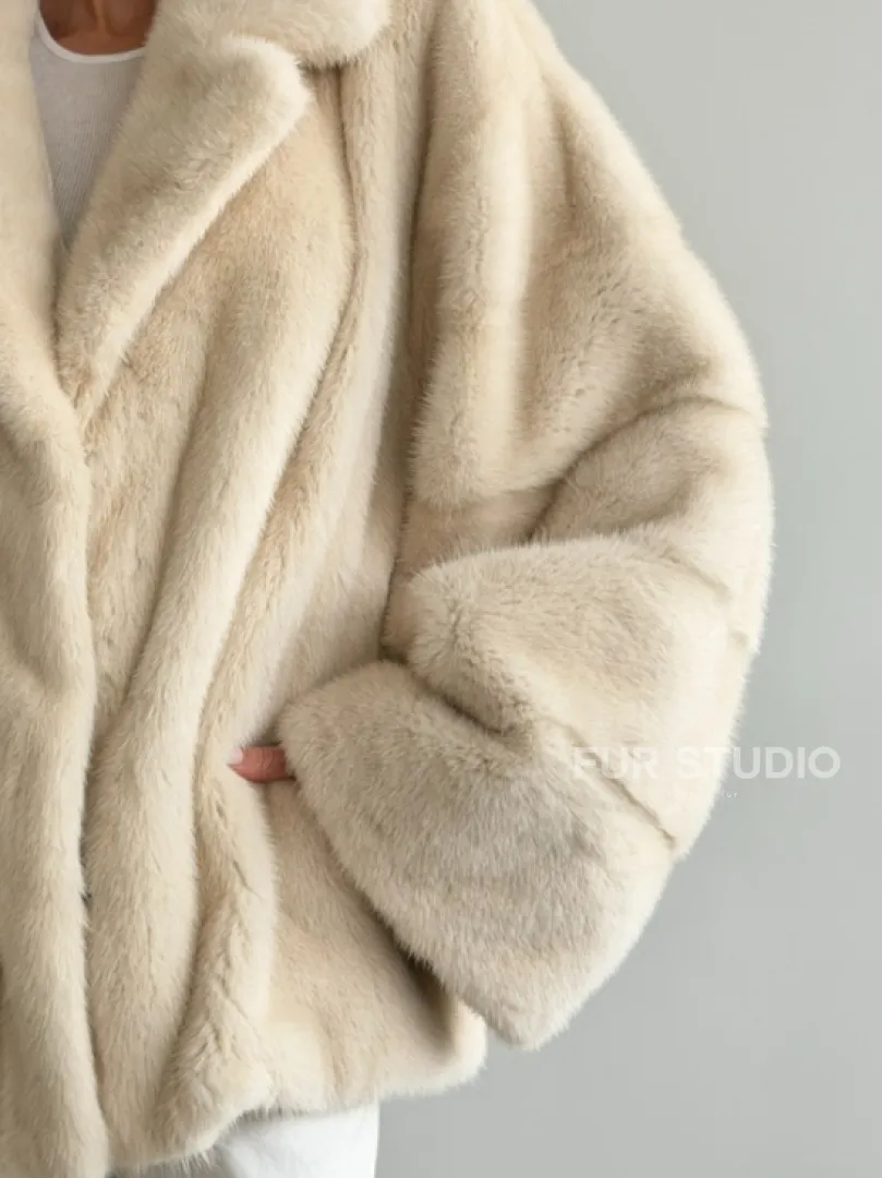 Женский норковый полушубок