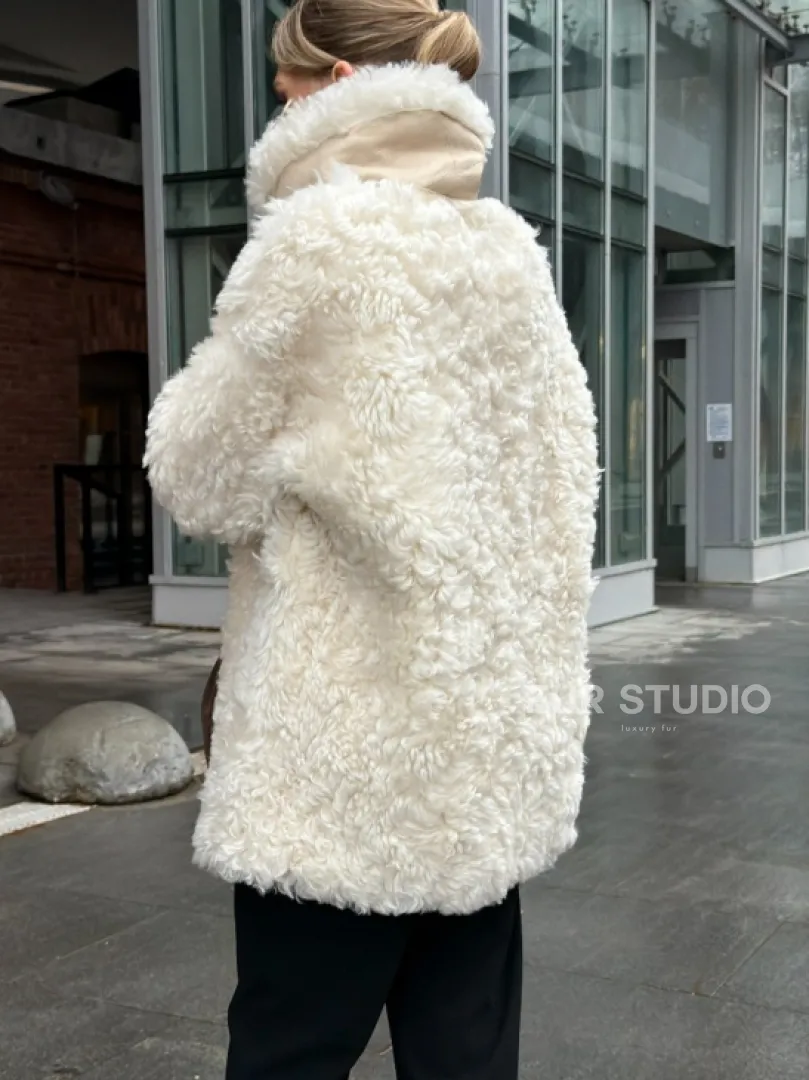 Белая шубка из тиградо - фото 9