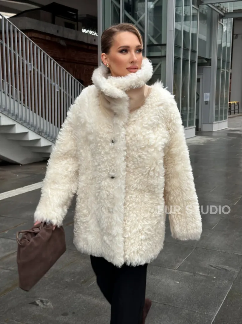 Белая шубка из тиградо - фото 16