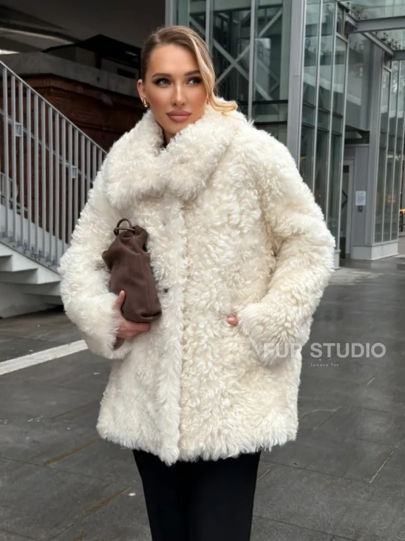 Белая шубка из тиградо - фото 12