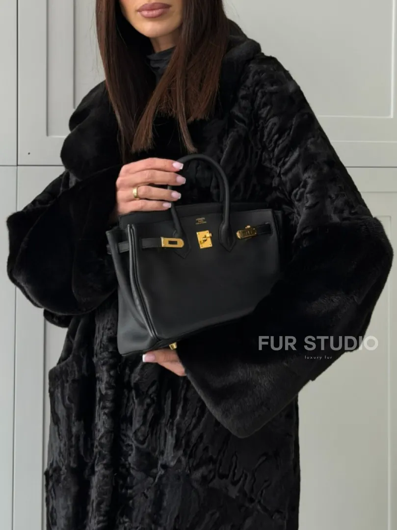 Черная шуба из каракуля с норкой