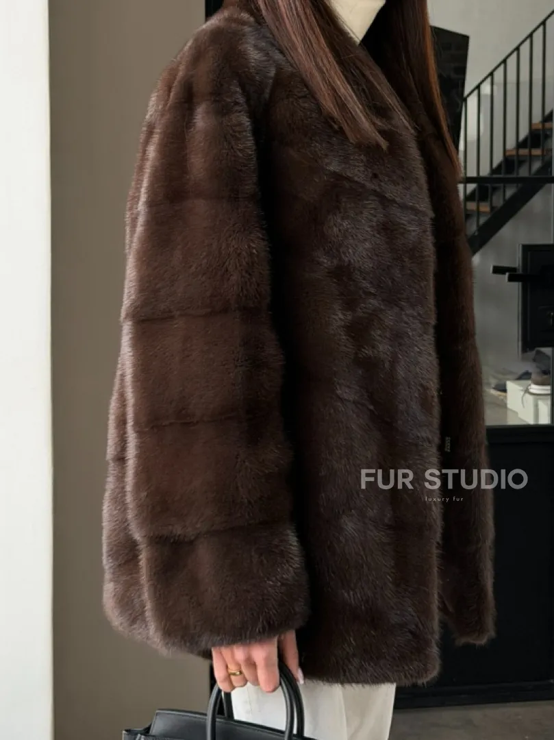 Женский норковый полушубок