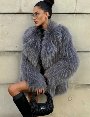 Шуба из меха енота на вязанной основе