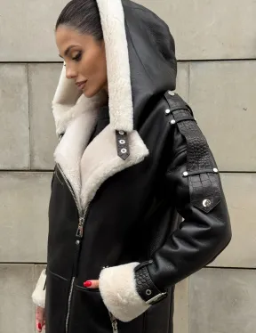 Черная удлиненная дубленка авиатор  с капюшоном на белой овчине