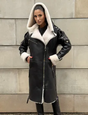 Черная удлиненная дубленка авиатор  с капюшоном на белой овчине