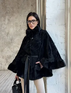 Женское меховое манто из меха каракульчи с отделкой из норки