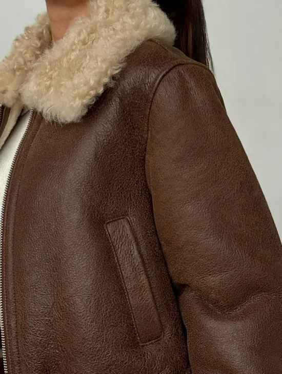 Короткая дубленка - женская