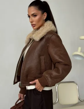 Короткая дубленка - женская