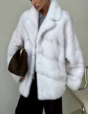 Белый норковый полушубок