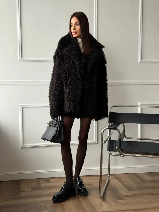 Коричневая дубленка из меха Тиградо