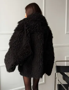 Коричневая дубленка из меха Тиградо