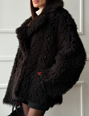 Коричневая дубленка из меха Тиградо