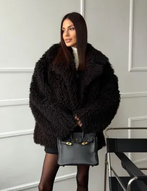 Коричневая дубленка из меха Тиградо