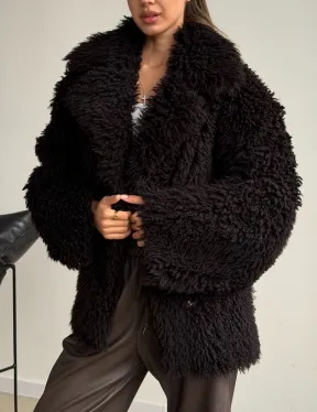 Коричневая дубленка из меха Тиградо