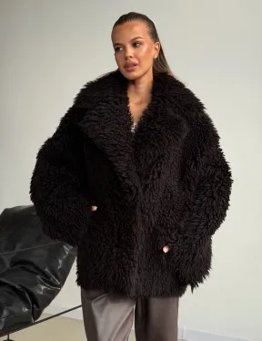 Коричневая дубленка из меха Тиградо