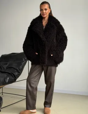 Коричневая дубленка из меха Тиградо