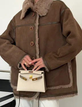 Коричневая замшевая дубленка на мехе тиградо