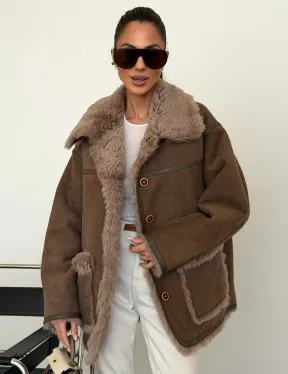 Коричневая замшевая дубленка на мехе тиградо