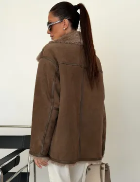 Коричневая замшевая дубленка на мехе тиградо