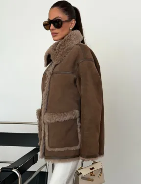 Коричневая замшевая дубленка на мехе тиградо