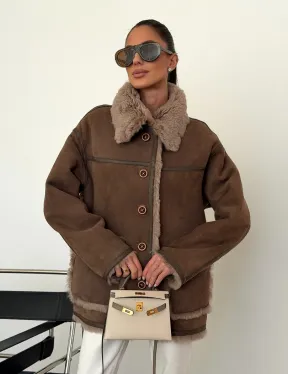 Коричневая замшевая дубленка на мехе тиградо