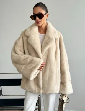 Женский норковый полушубок