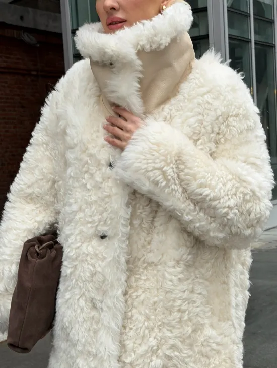 Белая шубка из тиградо