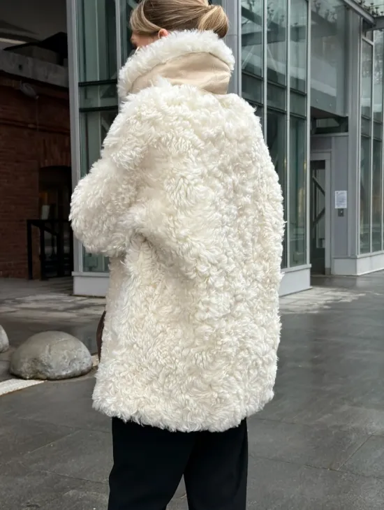 Белая шубка из тиградо