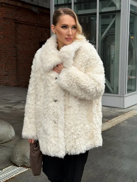 Белая шубка из тиградо