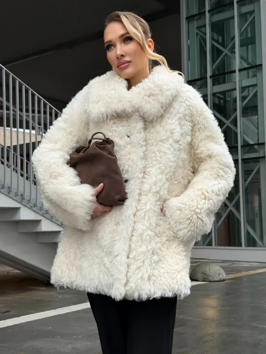 Белая шубка из тиградо