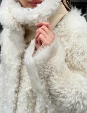 Белая шубка из тиградо