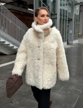 Белая шубка из тиградо