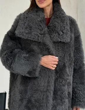 Серая дубленка из тиградо