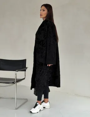 Черная шуба из каракуля