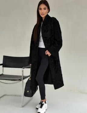 Черная шуба из каракуля