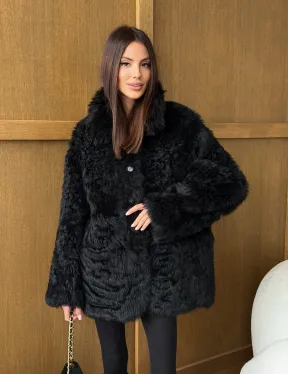 Черная двухсторонняя дубленка из меха тиградо