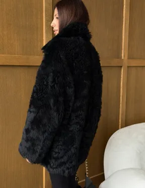 Черная двухсторонняя дубленка из меха тиградо