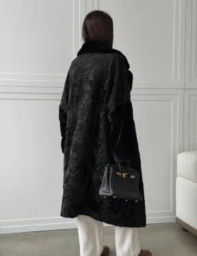 Черная шуба из каракуля с норкой